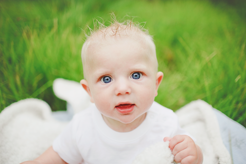 cute baby in grass family session kids family session pictures photography photographer irvine california lake forest orange county
